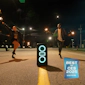 Klipsch Miami Party Speaker in middle of empty street at night with friends dancing around with sparklers with Gear Patrol Best of CES 2025 badge 2000x2000
