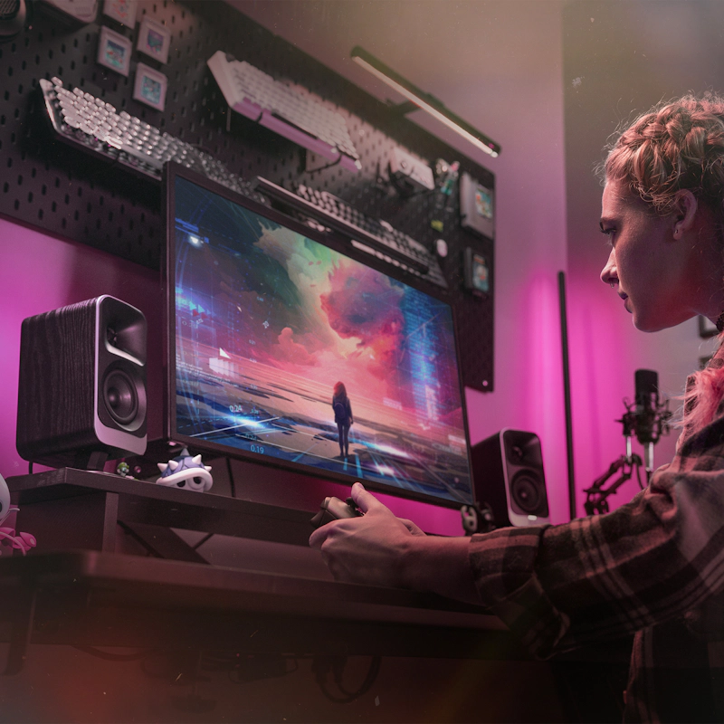 Klipsch Pro Media Lumina On Desktop with Gaming on Screen and Pink Lighting 2000x2000