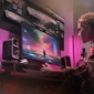 Klipsch Pro Media Lumina On Desktop with Gaming on Screen and Pink Lighting 2000x2000