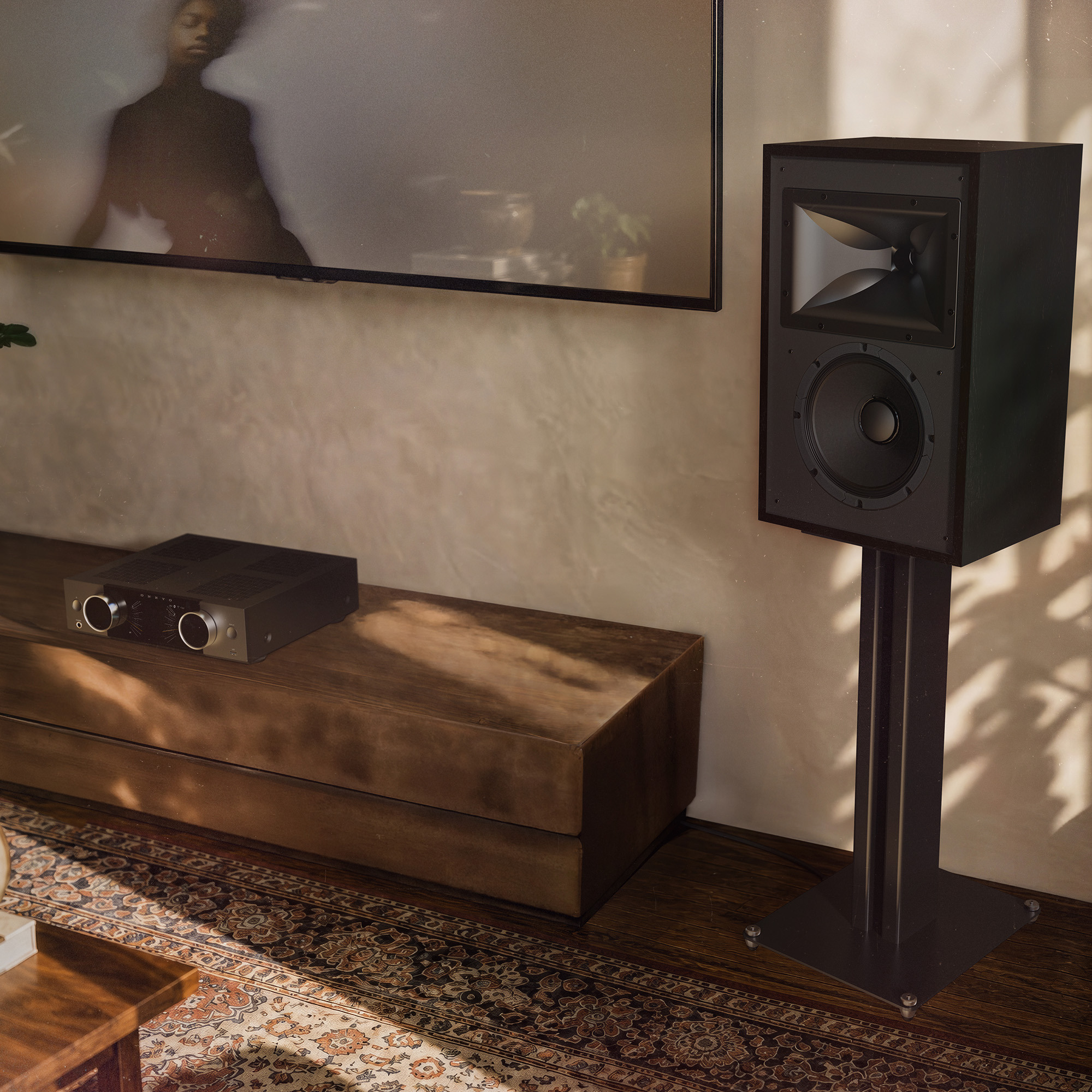 Klipsch Rebellion BK grilles off in sunny living room beside amplifier 2000x2000