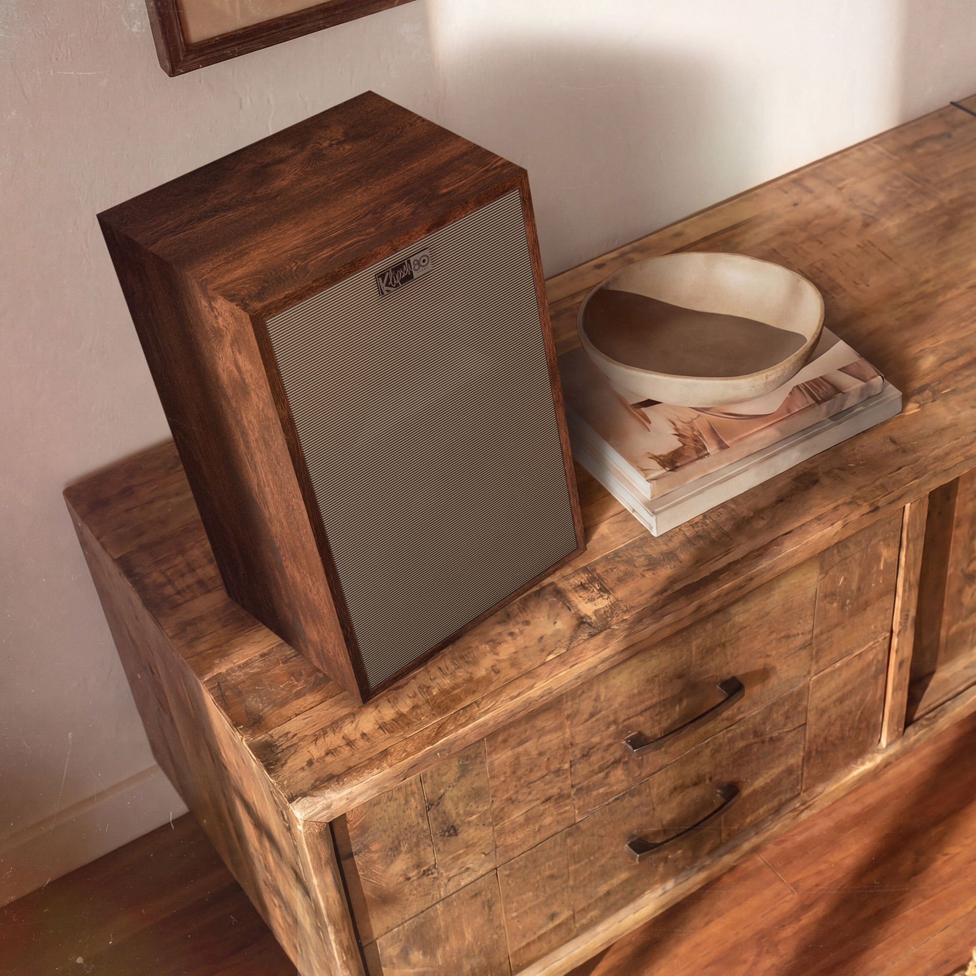 Klipsch Rebellion TW overhead on rustic wood console 2000x2000