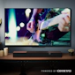 Klipsch Flexus Core 100 Under TV Playing Rock Concert 2000x2000 logo v02