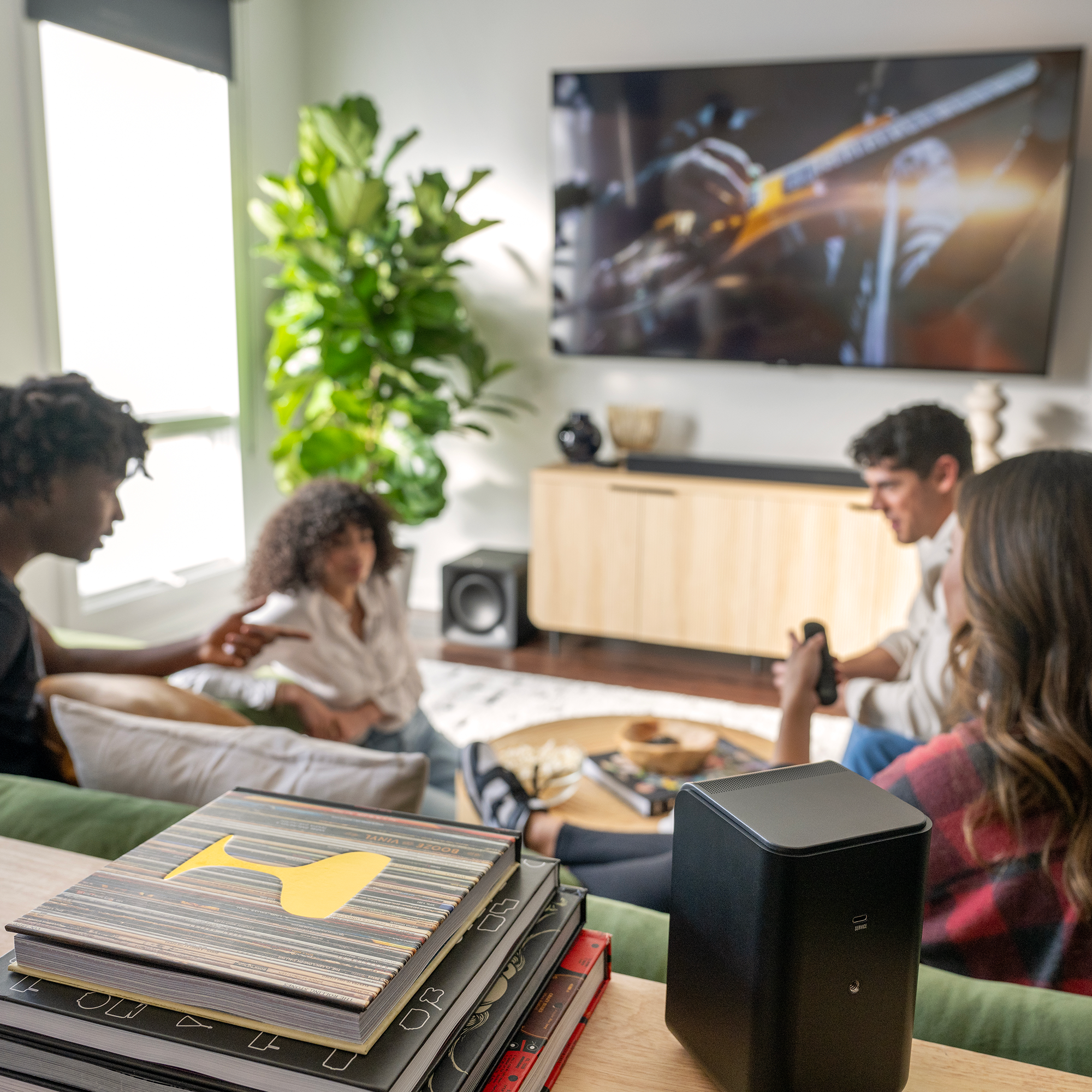 Klipsch Flexus SURR 100 behind friends hanging out 2000x2000