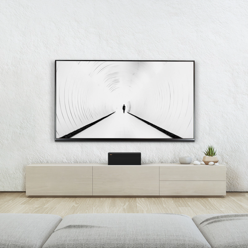 RP 500 C II sitting on a beige credenza under a TV with grille on