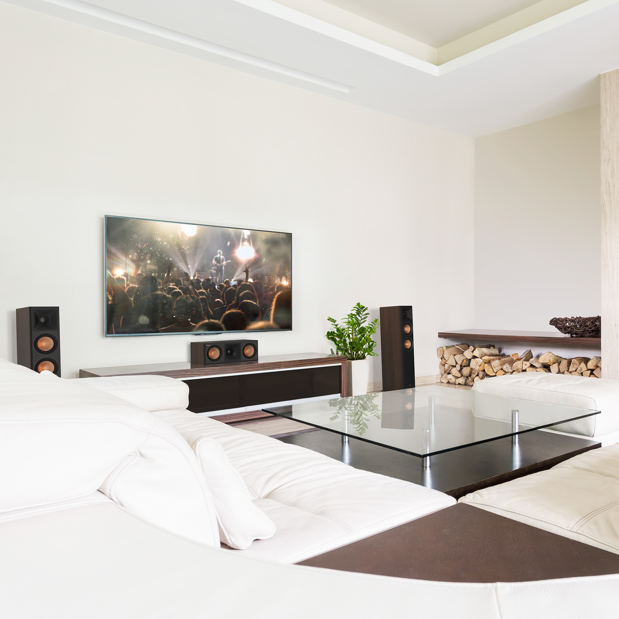 RP 500 C II sitting on a credenza under a TV in front of a large glass coffee table